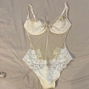 Elegant Cream Lace Bodysuit